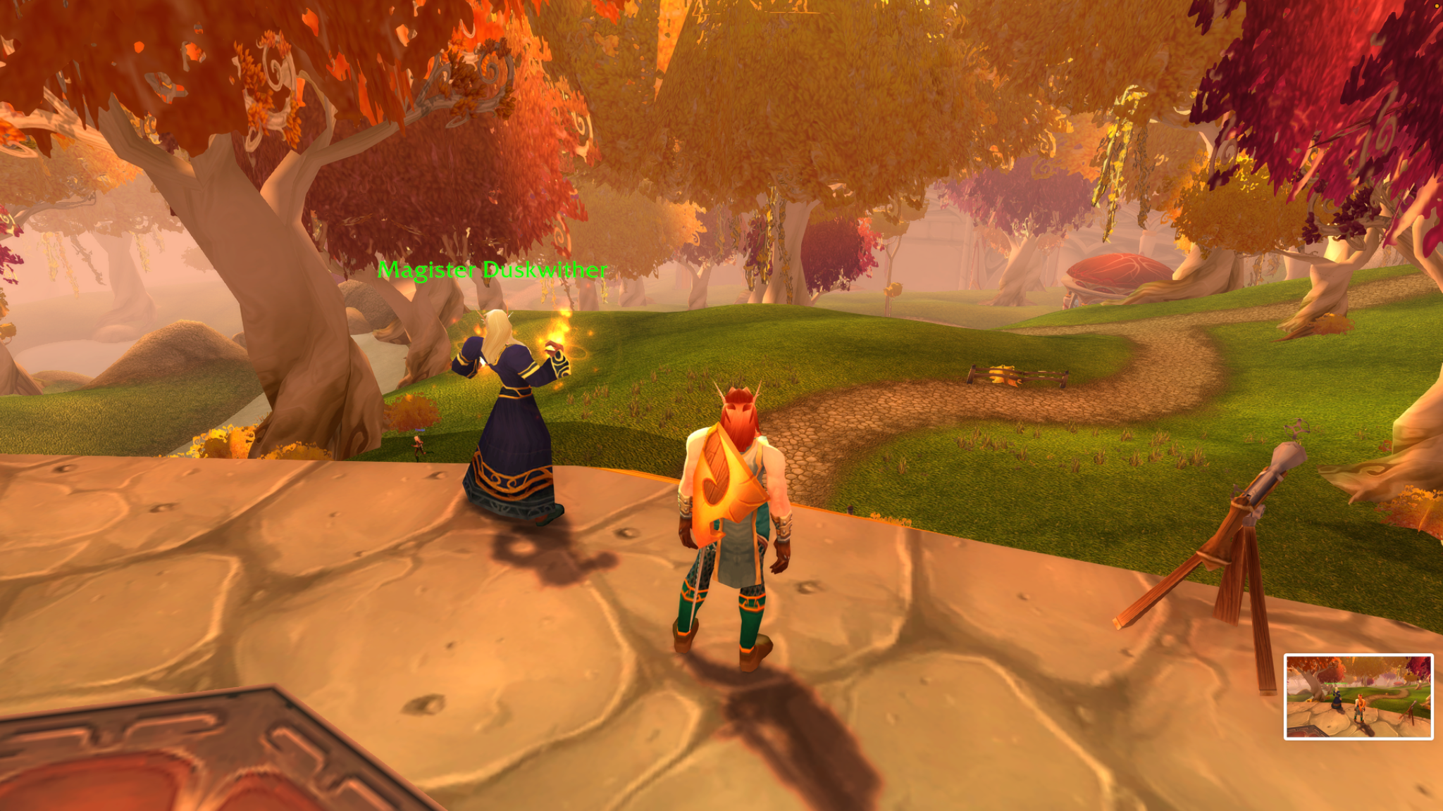 A shield-bearing blood elf stands beside Magister Duskwither as flames rise from the magister's hands.