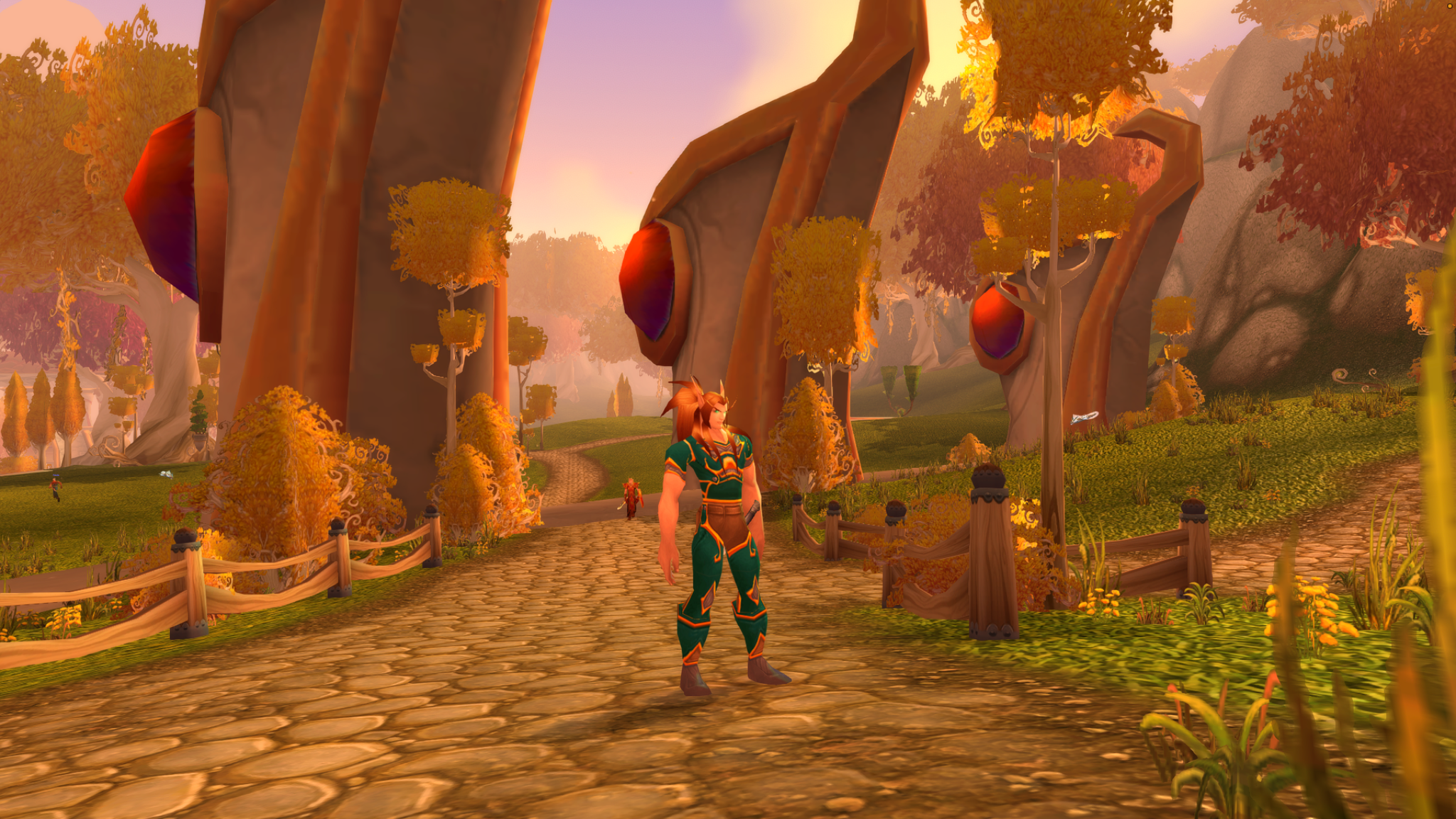 A red-haired blood elf stands on a sunlit path beneath towering arches set with red crystals.